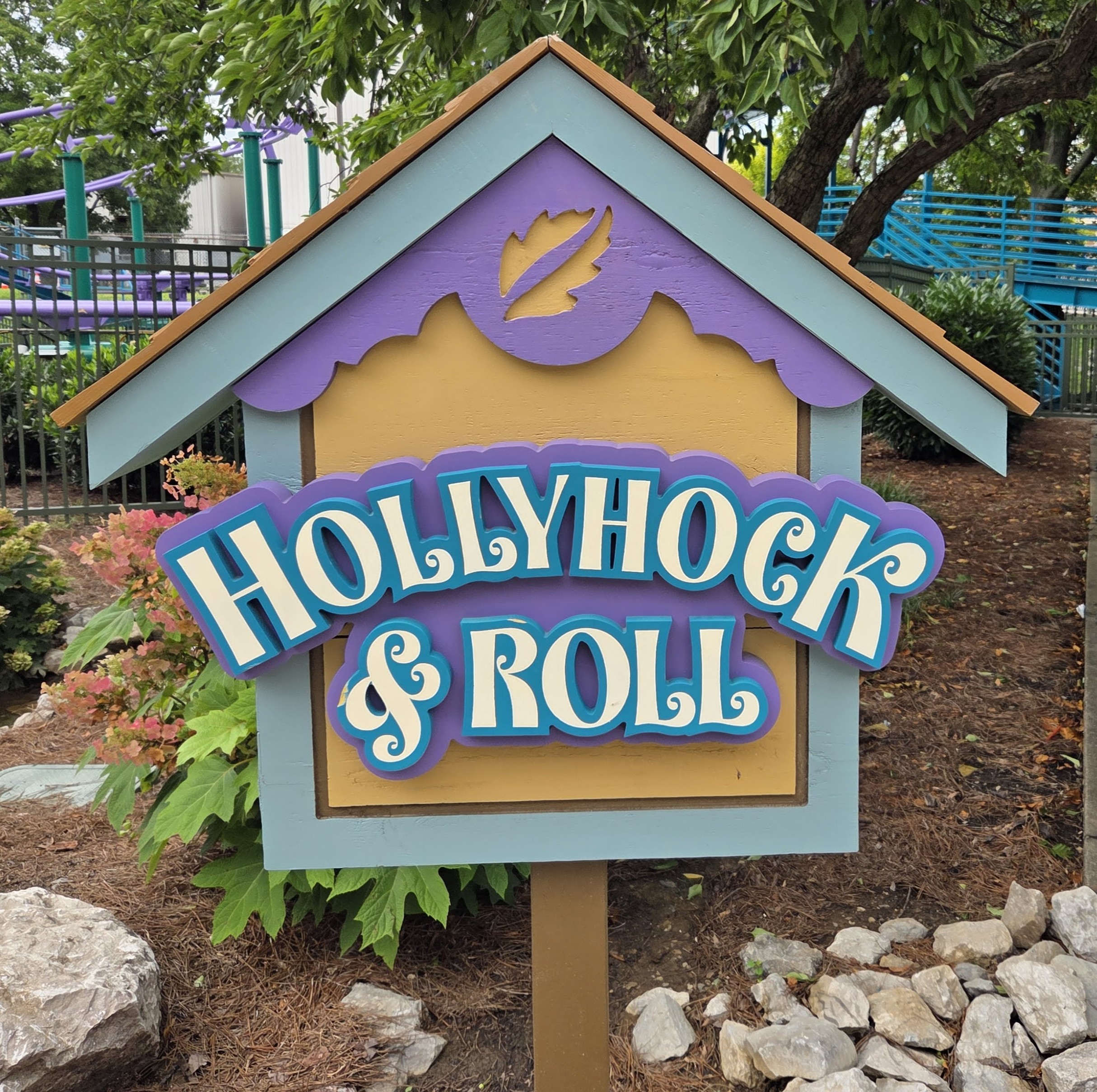 Hollyhock and Roll sign