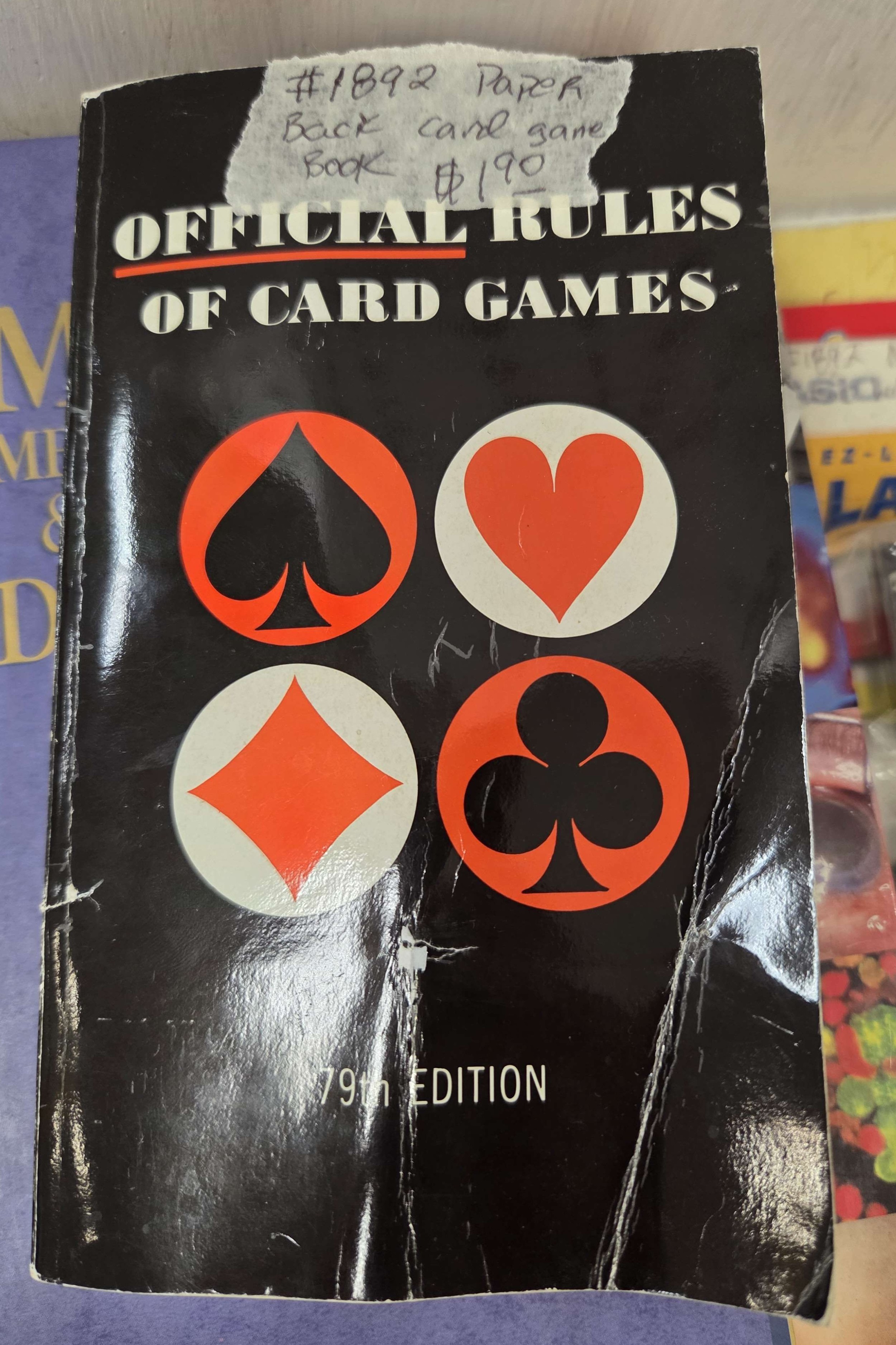Rule book titled 'Official Rules of Card Games'